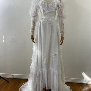 Vintage 70s Victorian puffy sleeves & lace white wedding dress by Bridallure